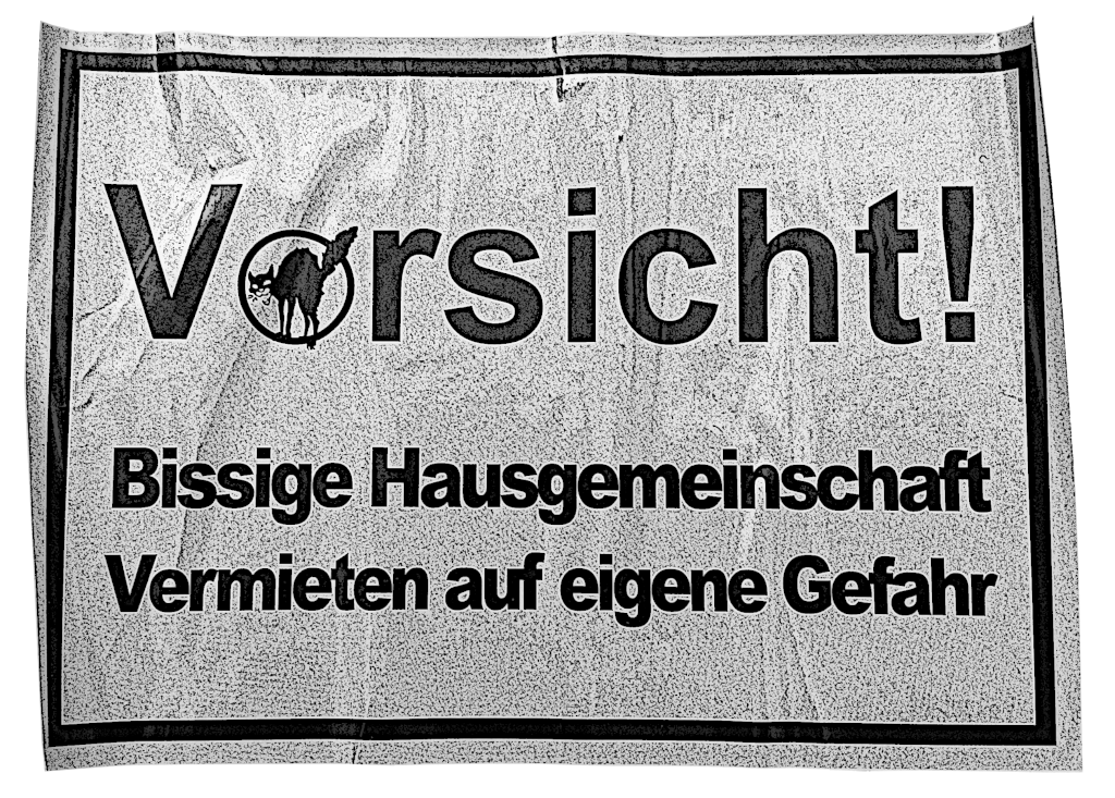 Ein Aufkleber. Darauf steht: "Vorsicht! Bissige Hausgemeinschaft. Vermieten auf eigene Gefahr". Im "o" von Vorsicht macht eine fauchende Katze einen Buckel.